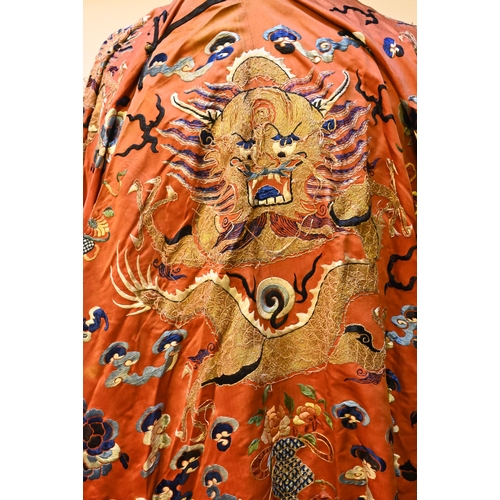 383 - A late 19th or early 20th century Chinese dragon robe, late Qing dynasty, embroidered with gilt and ... 