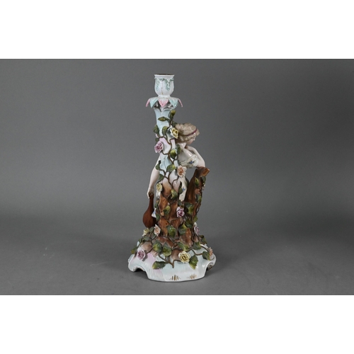 385 - An early 20th century Sitzendorf porcelain lamp-base modelled with a classical female with lute, on ... 