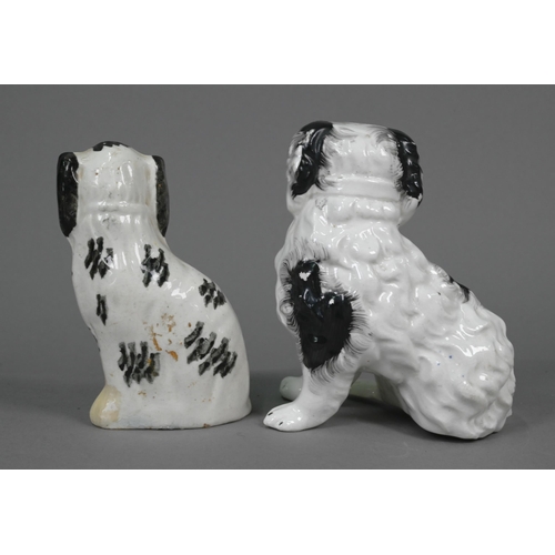 398 - Pair of Staffordshire pottery dalmatians, 13 cm high; a pair of poodles holding baskets of flowers i... 