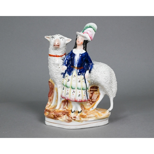 399 - Pair of 19th century Staffordshire spill vases, modelled with a ram and sheep with textured fleeces,... 