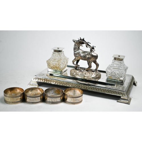 4 - Victorian epns inkstand surmounted by cast figure of a stag, and with two cut glass bottles, 18 cm h... 