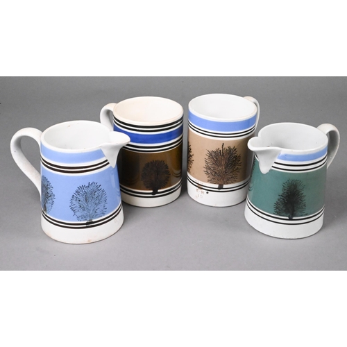 401 - Two Victorian mocha ware pint jugs and two pint mugs, bearing later Government measure over-stamps (... 