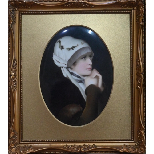 414 - A 19th century German porcelain oval plaque, 'Im Gebet', depicting a young lady at prayer, after F. ... 