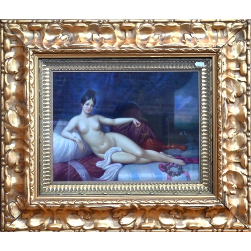 430 - A Continental ceramic large plaque, painted with an Odalisque, 30 x 39 cm, glazed frame