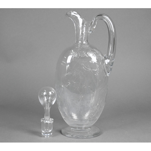 437 - A Victorian Aesthetic Movement wine ewer and stopper, finely-cut with exotic birds in watery woodlan... 