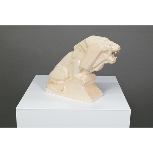 439 - An Art Deco Ashtead Pottery roaring lion on wedge plinth, 19 x 22 cm (cracked)