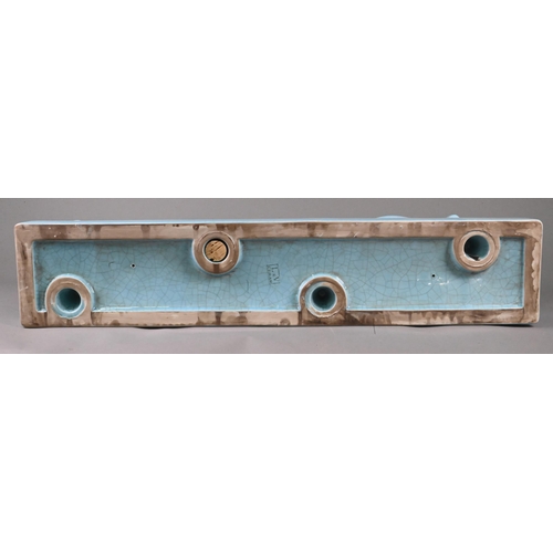 444 - An L&V Ceram large turquoise-glazed stalking tiger with overall crackle finish, on rectangular b... 