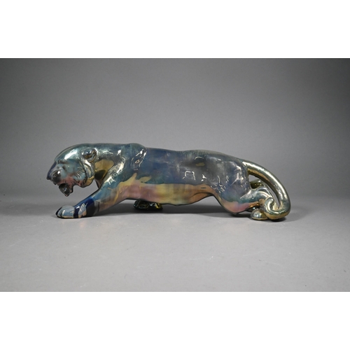 446 - A French Gres-Flammes Vosges Rambervillers earthenware stalking tiger with silver-resin lustre glaze... 