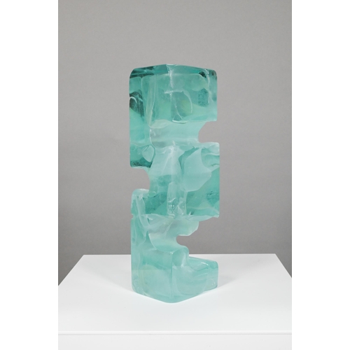 451 - A mottled green glass block, cast with 'Greek key' form, unsigned, 27 cm high