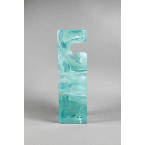 451 - A mottled green glass block, cast with 'Greek key' form, unsigned, 27 cm high