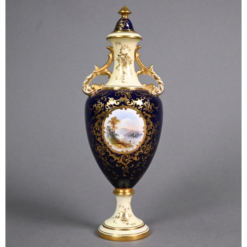 452 - A Coalport small china baluster vase and cover, painted with 'Loch Awe', signed E. D. Ball, on a blu... 