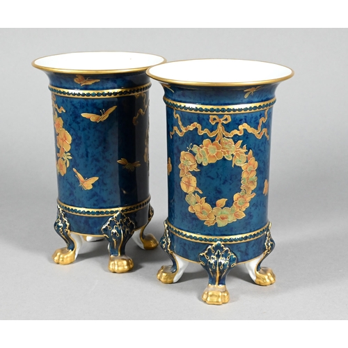 460 - A pair of Royal Crown Derby cylindrical vases with flared rims, gilded floral wreaths and moths on a... 