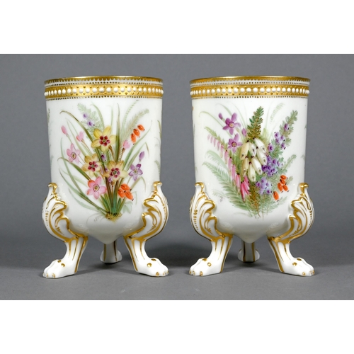 462 - A pair of opaque cream glass spill-vases, finely-painted with floral sprays and with gilded jewellin... 