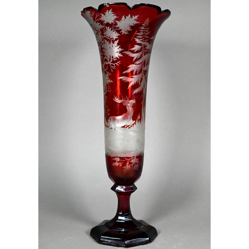 474 - A 19th century Bohemian large ruby flash glass vase, finely-etched with stag and hounds in woodland ... 