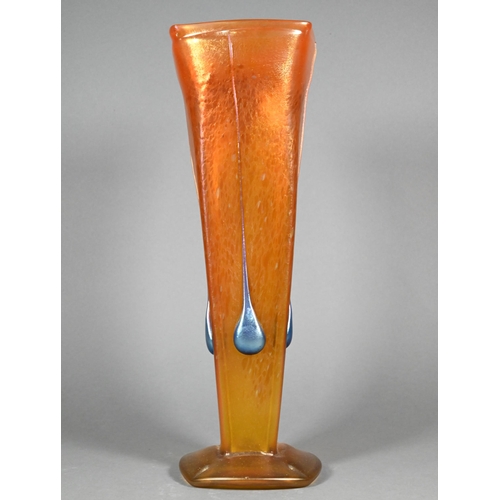 482 - An Art Nouveau square glass vase in the manner of Loetz, with tangerine lustre mottled ground, appli... 