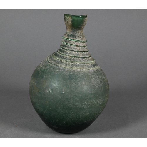 485 - A Middle Eastern glass vessel in the antiquity manner, of globular form, the narrow neck and shoulde... 