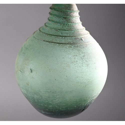 485 - A Middle Eastern glass vessel in the antiquity manner, of globular form, the narrow neck and shoulde... 