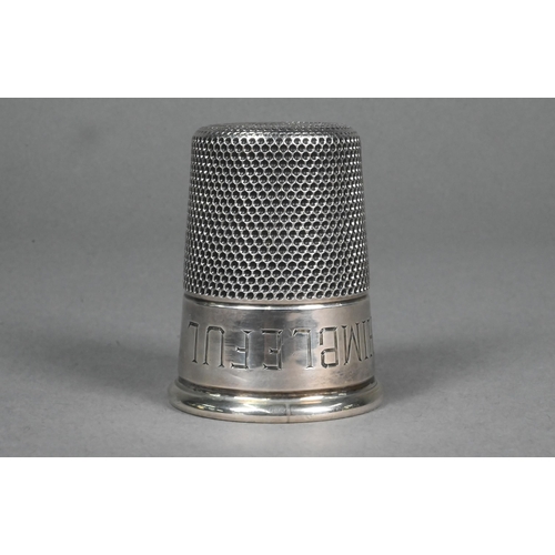 63 - A silver novelty shot tumbler in the form of an outsize thimble, engraved 'Just a Thimbleful', Charl... 