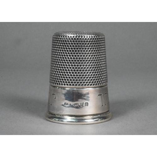 63 - A silver novelty shot tumbler in the form of an outsize thimble, engraved 'Just a Thimbleful', Charl... 