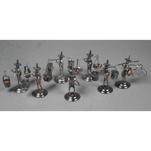 68 - A set of twelve Chinese Sterling place-card or menu holders, modelled as street vendors, 6 cm high -... 