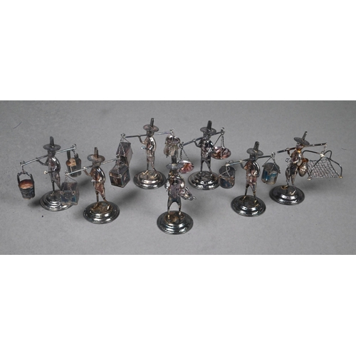 68 - A set of twelve Chinese Sterling place-card or menu holders, modelled as street vendors, 6 cm high -... 