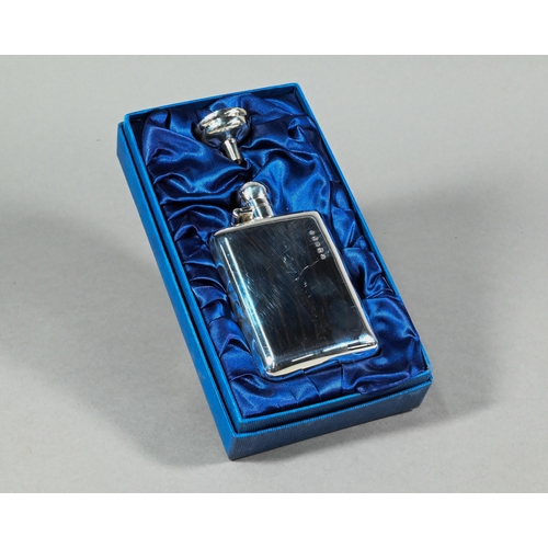 73 - A silver hip-flask with hinged bayonet bun cover, Chawner & Co, London 2002, as new in fitted gi... 