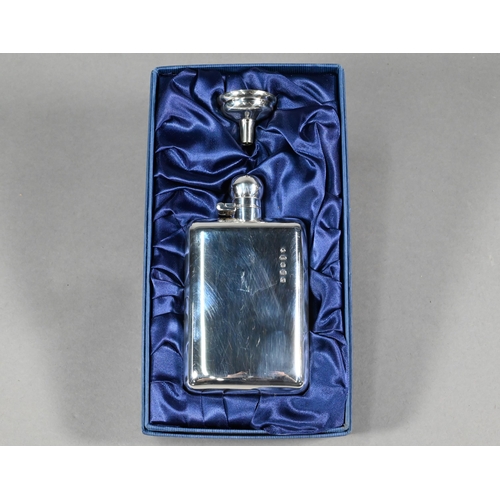 73 - A silver hip-flask with hinged bayonet bun cover, Chawner & Co, London 2002, as new in fitted gi... 