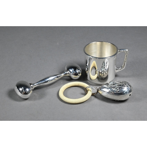 74 - A modern loaded silver baby-rattle, Douglas Pell, London 2002, and a small silver Christening mug, L... 