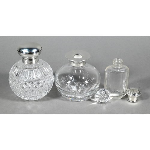 78 - Two globular cut glass cologne bottles with silver mounts, Sheffield/Birmingham 2000 to/w a smelling... 