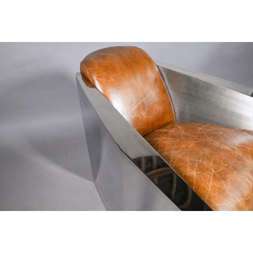 785 - A bespoke polished alloy and tan leather 'Aviator' styled armchair, approx. 103 cm dep x 80 cm wide