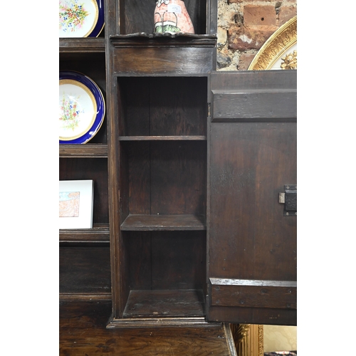 802 - An 18th century and later oak high dresser, with three drawers, raised on turned front legs, 190 cm ... 