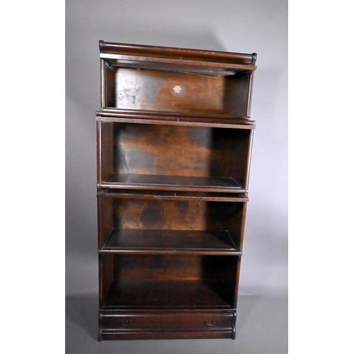 815 - An oak four section Globe Wernicke bookcase, with base drawer (one door missing), 87 cm x 176 cm h