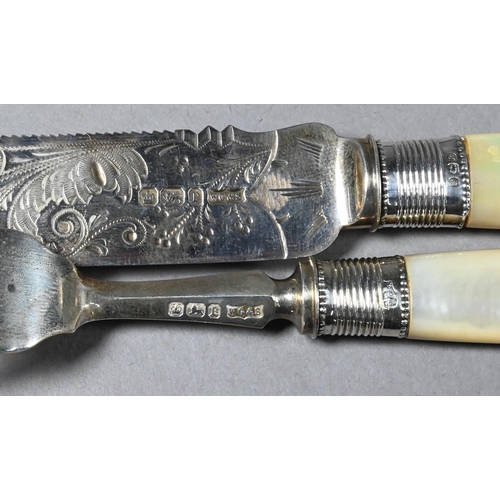 83 - A late Victorian cased silver cake knife and fork with engraved decoration and mother of pearl handl... 