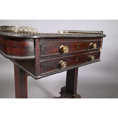 831 - A Regency rosewood games table, the chequerboard inset top flanked by pierced brass galleries to the... 