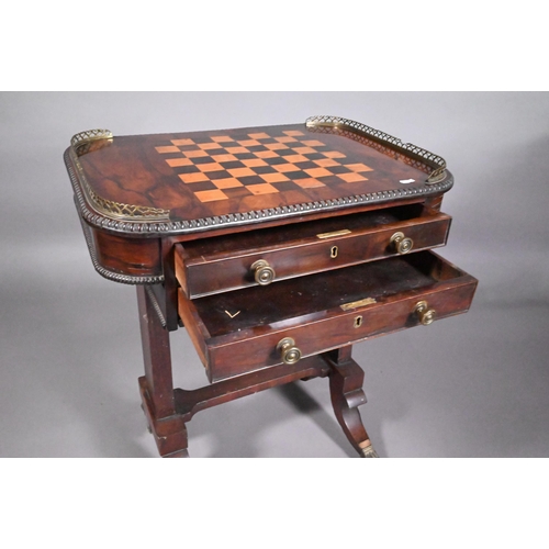 831 - A Regency rosewood games table, the chequerboard inset top flanked by pierced brass galleries to the... 