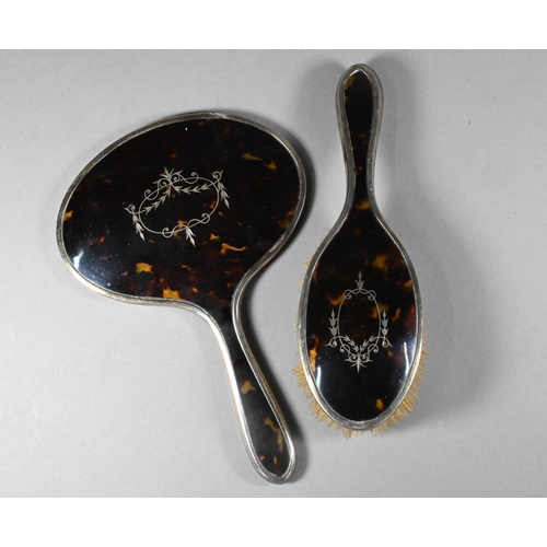 84 - Silver and tortoiseshell pique-work hand-mirror and hairbrush to/w a pair of loaded silver baluster ... 