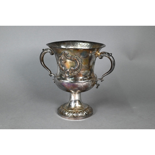 85 - A Victorian silver trophy cup of campana form with twin scroll handles, on stemmed and flared foot, ... 