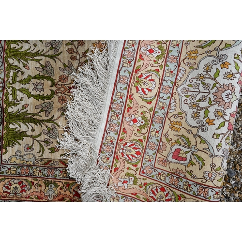 906 - A fine Turkish Hereke silk prayer rug, the floral design on ochre ground, 120 cm x 72 cm