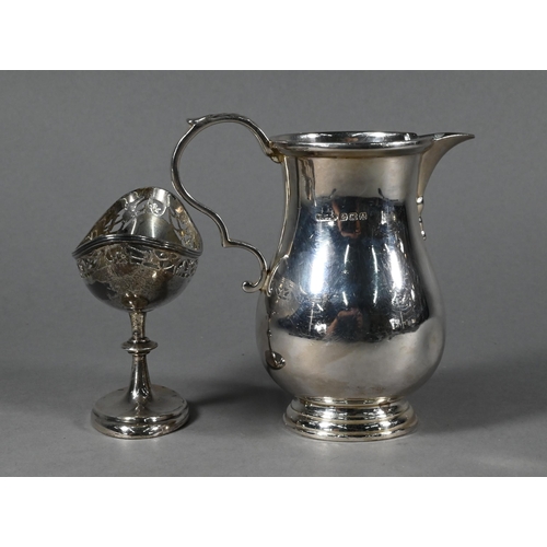 91 - A heavy quality silver pear-shaped cream jug in the Georgian manner, FG Rose, Birmingham 1925, 12 cm... 