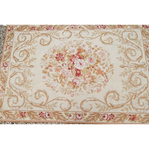 910 - Two traditionally executed Aubusson style floral decorated rugs, 182 cm x 122 cm and 180 cm x 120 cm