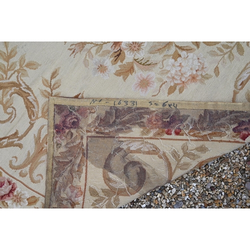 910 - Two traditionally executed Aubusson style floral decorated rugs, 182 cm x 122 cm and 180 cm x 120 cm