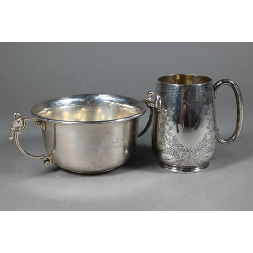 92 - A Victorian foliate-engraved silver Christening mug, London 1885 to/w a porringer, the twin handles ... 