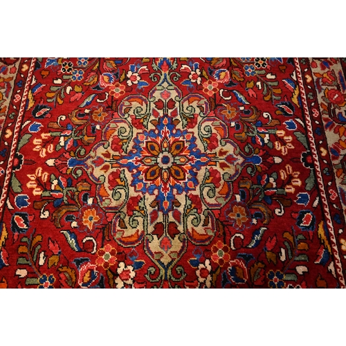 927 - A Persian Lilihen carpet, 295 cm x 159 cm