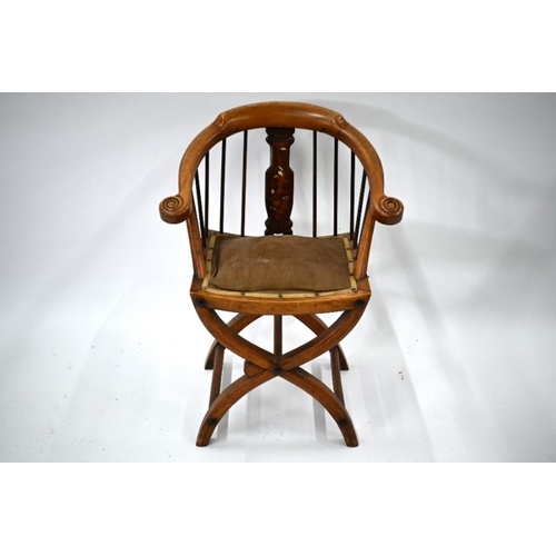 937 - An antique Chinese inlaid hardwood chair, with cushion seat, on a cross frame base