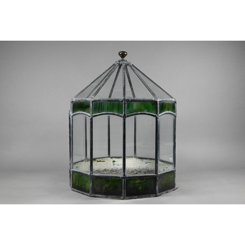940 - A vintage leaded glass terrarium with green marbled panels, 45 cm high