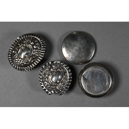 95 - Two embossed silver pill-boxes, Birmingham 1899/1902 to/w an ep plain pill-box (3)