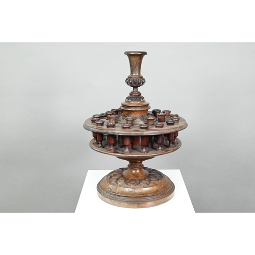 955 - An antique carved and turned wood snuff or tobacco stand with sectional central pillar surrounded by... 