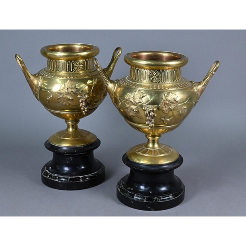 957 - Pair of 19th century French brass garniture urns with relief vine and insects decoration, 30 cm high