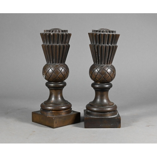 959 - A pair of 19th century heavy bronze 'thistle' doorstops, 20 cm high