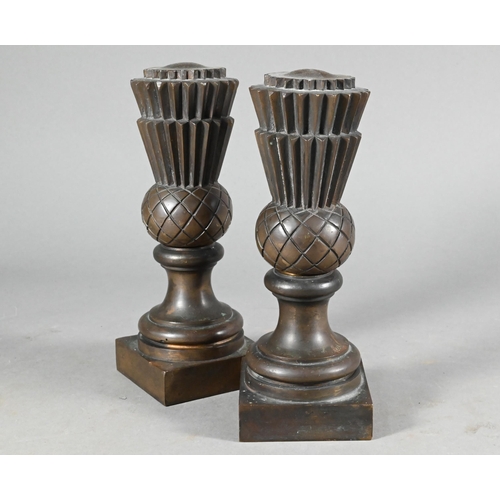 959 - A pair of 19th century heavy bronze 'thistle' doorstops, 20 cm high